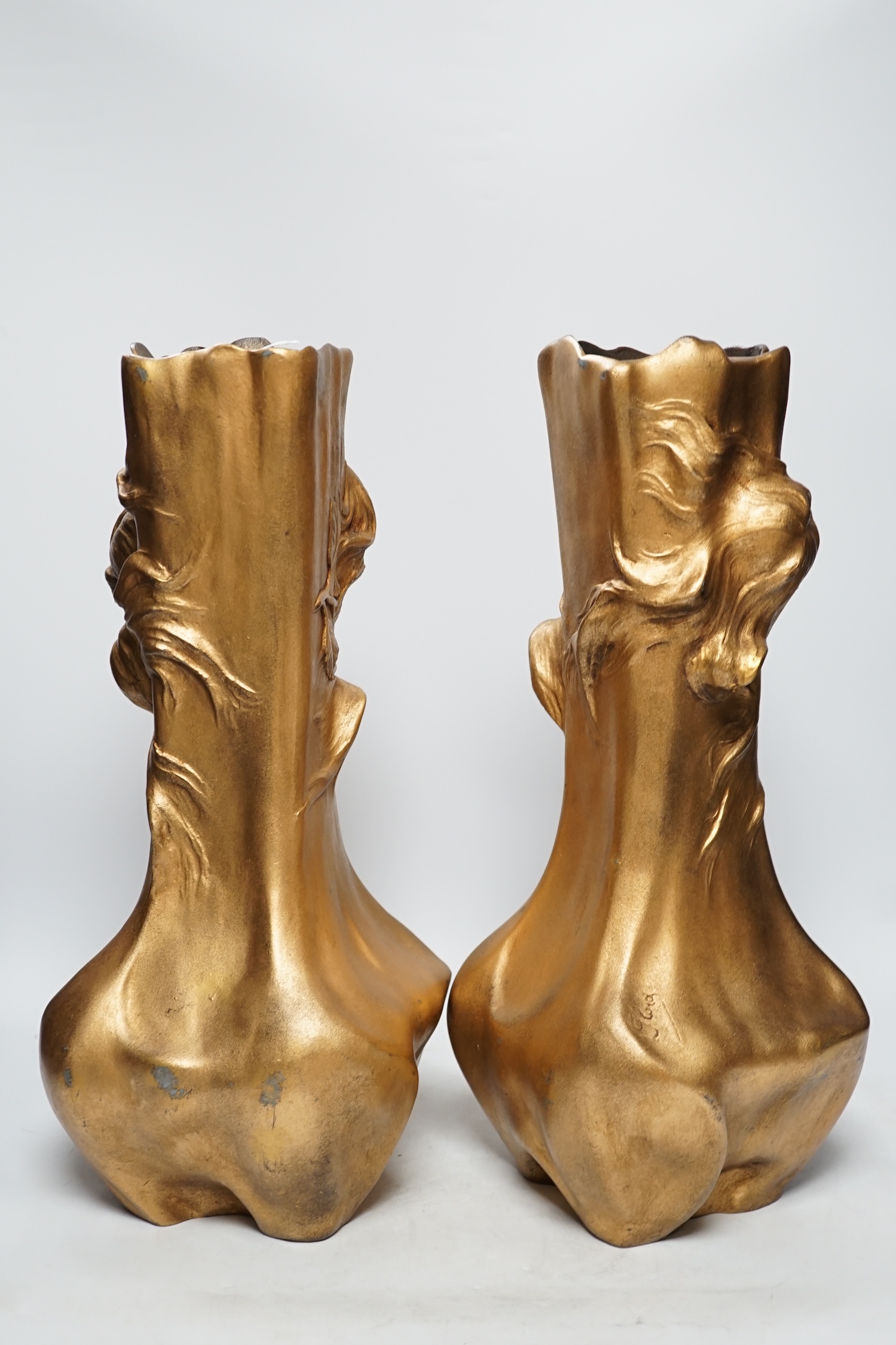 A pair of Art Nouveau figural gilt metal vases, 42cm high